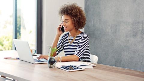 woman sitting at computer