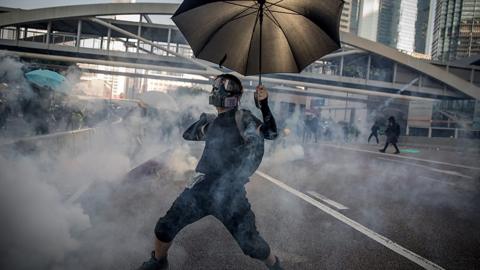 Protesters clash with police on the streets of Hong Kong