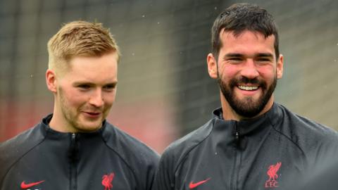 Liverpool goalkeepers Caoimhin Kelleher and Alisson in training