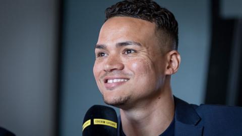 Ex-footballer Jermaine Jenas said he hopes black football players perform well so they don't get racial abuse online.