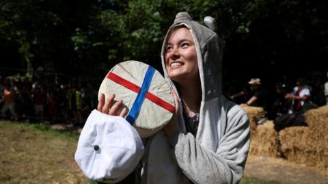 Alix Huegas, winner of the Women's cheese rolling race 2026