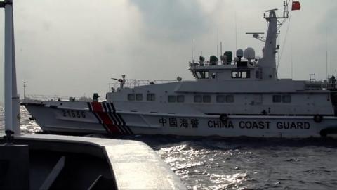 China Coast Guard vessel blocks ship