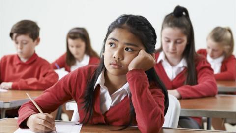 Child taking exam