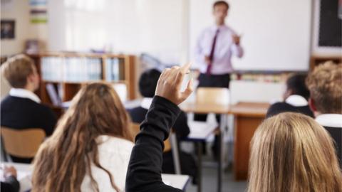 Generic image of classroom with pupils and teacher