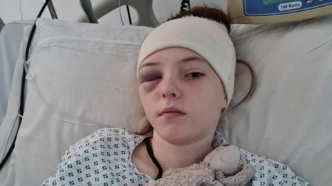 Grace in hospital following surgery to remove a brain tumour