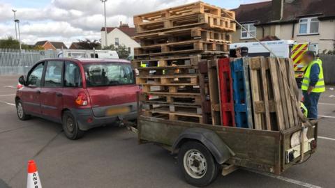 pallets on the back of a car
