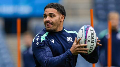 Sione Tuipulotu in Scotland training