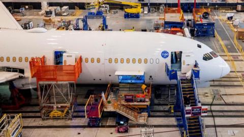 Boeing employees assemble 787s inside their main assembly building on their campus in North Charleston, South Carolina, U.S