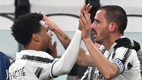 Leonardo Bonucci (right) and Winston McKennie celebrate the former's winning goal against Torino