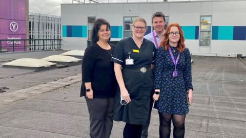 Consultant Anaesthetist Bozena Lassota-Korba, Elective Care Matron Kelly Hutchins, Orthopaedic Consultant Mr Matt Hall and Operational Service Manager Cara O'Keefe at the planned site for the new ward at Yeovil District Hospital