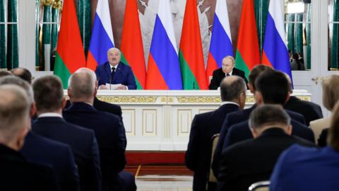 Russia's President Vladimir Putin and Belarus' President Alexander Lukashenko attend a press conference