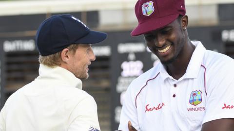 Joe Root and Jason Holder