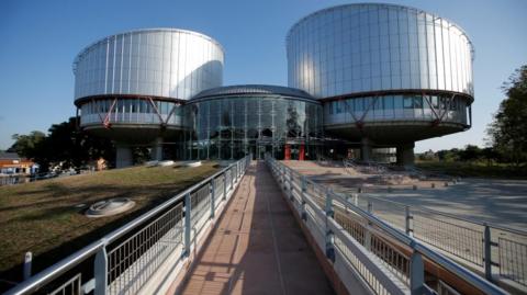 The building of the European Court of Human Rights which has two distinctive circular towers built on it