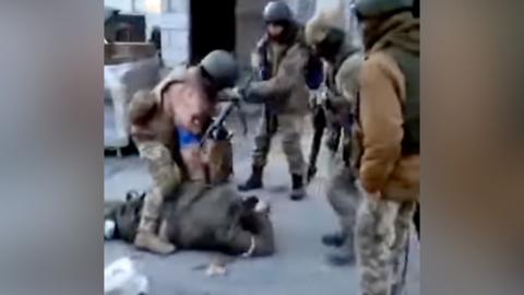 Still from video claiming to show mistreatment of Russian prisoners