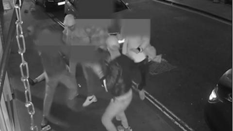 CCTV of an undercover officer during a watch robbery