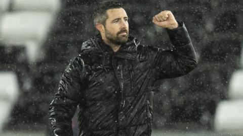 Swansea caretaker boss Alan Sheehan celebrates