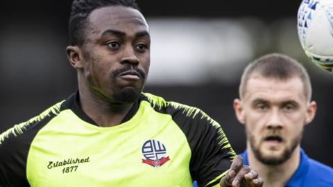 Joe Dodoo in action for Bolton