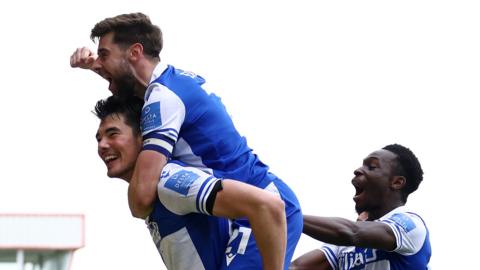 Bristol Rovers players celebrate a goal