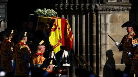 Crowds line the streets of Edinburgh to pay their respects to Queen Elizabeth II.