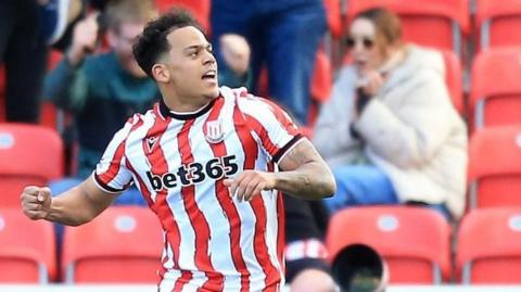 Stoke City's Million Manhoef punches the air in celebration after scoring against Watford