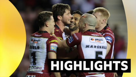 Wigan Warriors' Ethan Havard celebrates scoring a try