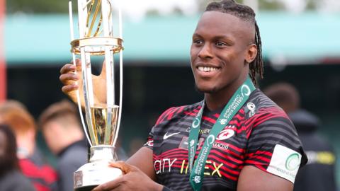 Saracens and England lock Maro Itoje with the Championship trophy