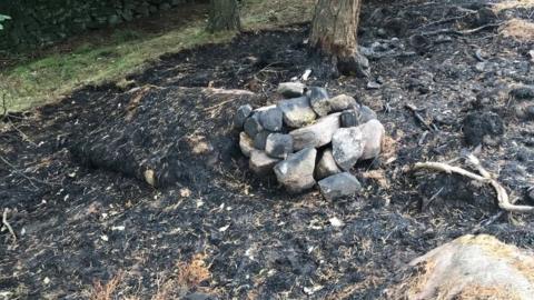 The camp fire, believed to have started the moorland blaze