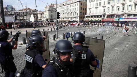 England fans clash with police ahead of the game against Russia on June 11, 2016 in Marseille, France.