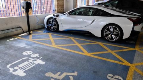 Dual electric/disabled parking bay