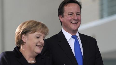 PM David Cameron with Chancellor Merkel, 2011 file pic