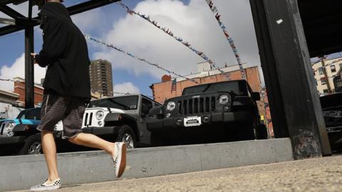 Jeep Wranglers are displayed at a Manhattan Fiat Chrysler dealership on July 23, 2018 in New York City.