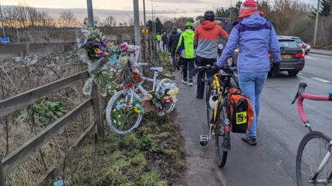 Residents at the vigil near Oxford Parkway station to remember a cyclist who died last week.