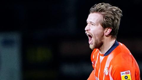 Luton's Luke Berry celebrates his goal against Millwall