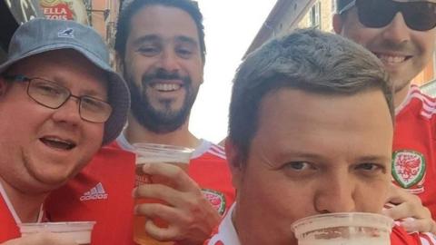 Dan with fellow Wales fans outside bar