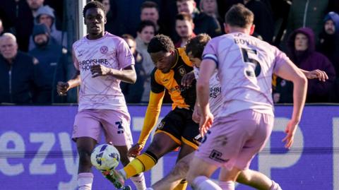 Bobby Kamwa in action for Newport