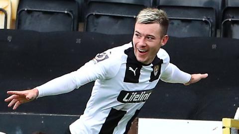 Callum Roberts celebrates scoring against Barnet