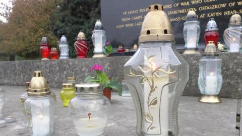 Candles on grave at Gunnersbury Cemetery