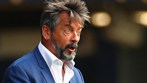 Phil Brown on the sidelines