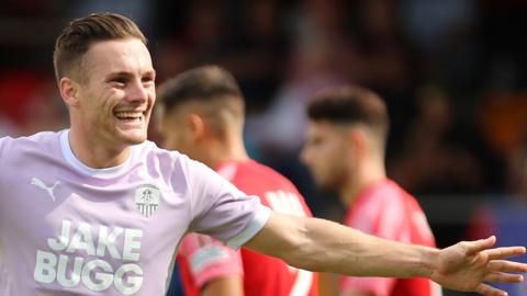 Macaulay Langstaff celebrates scoring for Notts County