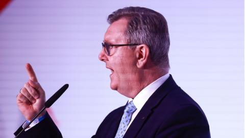 DUP leader Sir Jeffrey Donaldson delivers his keynote speech during his party's annual conference at the Crowne Plaza Hotel in Belfast.