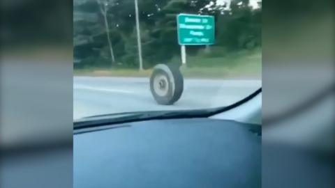 A tyre caused a crisis on a New Jersey motorway when it fell off a lorry and crashed into a car.