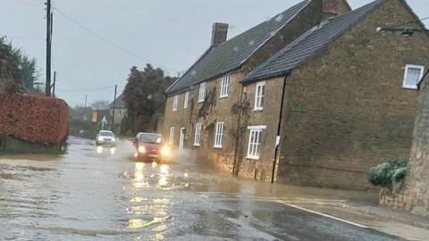 Flooded road in Haselbury Plucknett