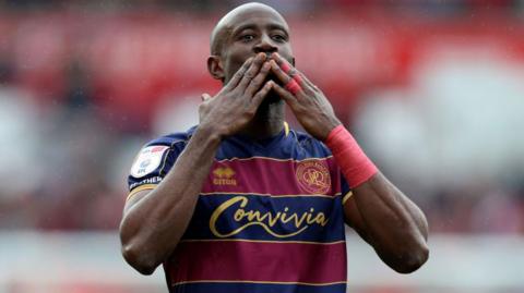 Albert Adomah blows a kiss to the QPR supporters