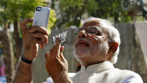 PM Modi taking selfie