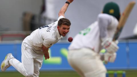 Yorkshire bowler Matt Milnes in action against Leicestershire