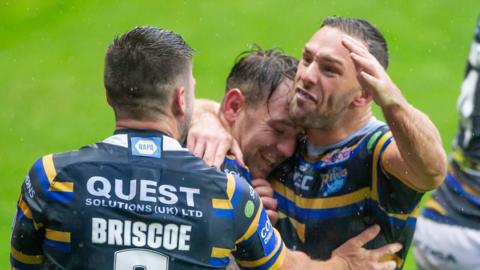 Leeds celebrate a try against Wigan