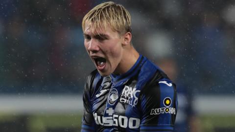 Atalanta striker Rasmus Hojlund celebrates scoring a goal