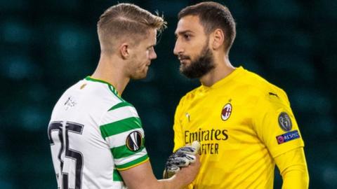 Celtic defender Kristoffer Ajer shakes hands with AC Milan goalkeeper Gianluigi Donnarumma