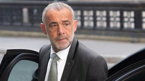 Michael Turner arrives at London's High Court