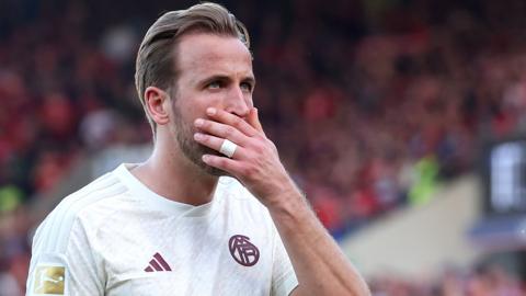 Harry Kane looks stunned after Bayern Munich's defeat at Heidenheim